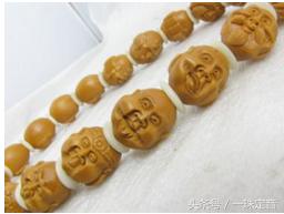 橄榄核雕和文玩核桃哪个好,橄榄核雕配桃核手串图片欣赏