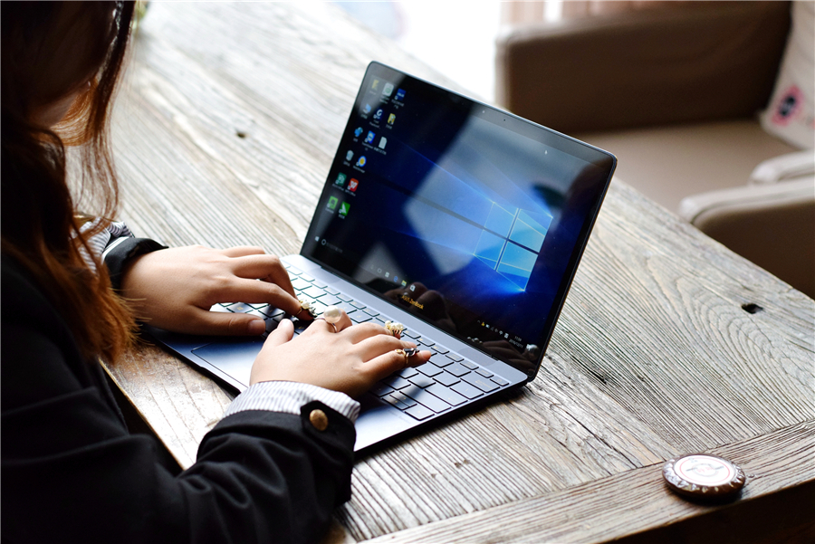 小米笔记本轻松拆机,比硬币还薄的小米笔记本开箱