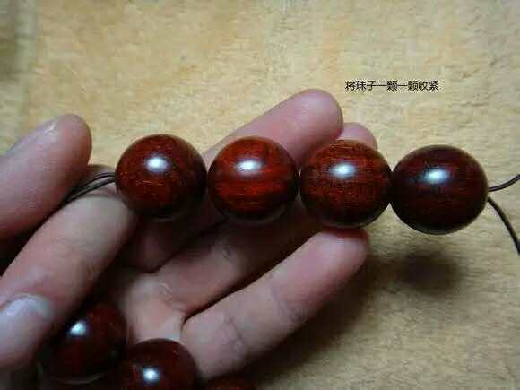 紫檀佛塔打结,小叶紫檀手串侧挂佛头打结方法