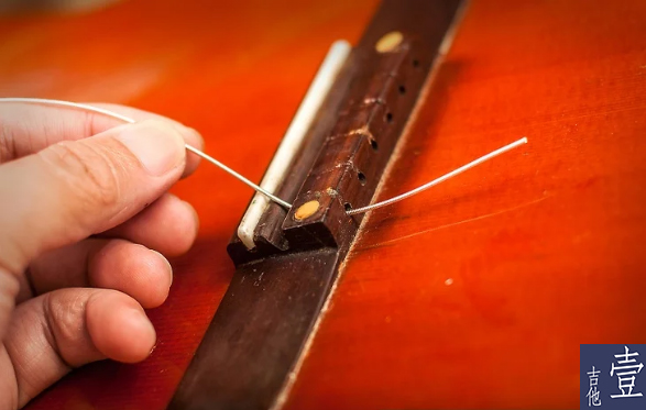 北航吉他,如何换吉他新弦