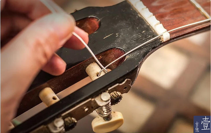 北航吉他,如何换吉他新弦
