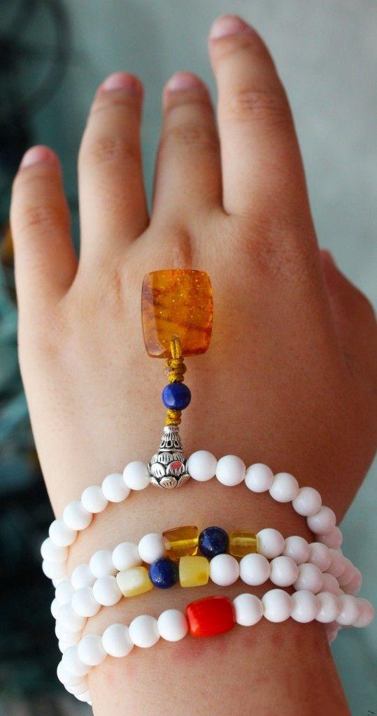 砗磲顶级,顶级白砗磲和太阳石