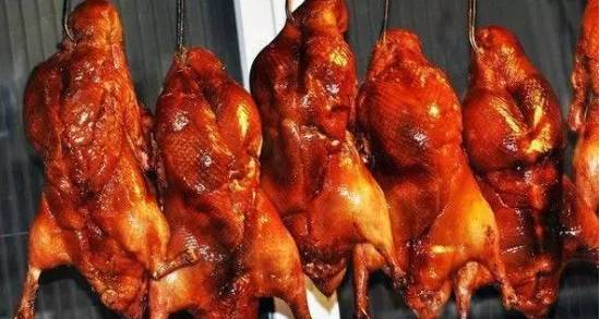 简述北京烤鸭的制作工艺流程,北京烤鸭的制作流程英语