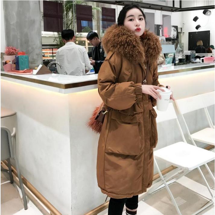 大毛领羽绒服显瘦时尚洋气女款,气质款大毛领羽绒服女高端