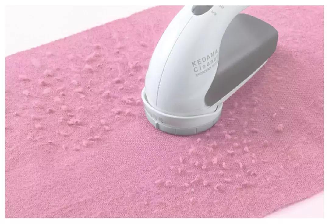 毛呢大衣老粘东西咋办,呢子大衣粘毛了怎么处理