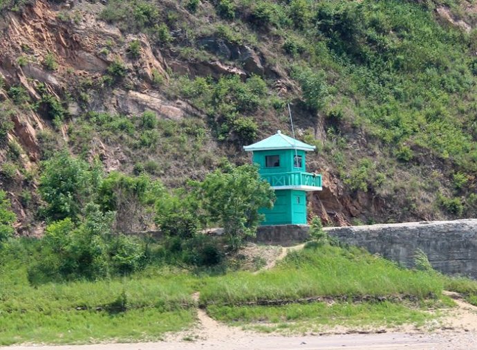 中朝边境美丽的风景,中朝边境桃花盛开的地方