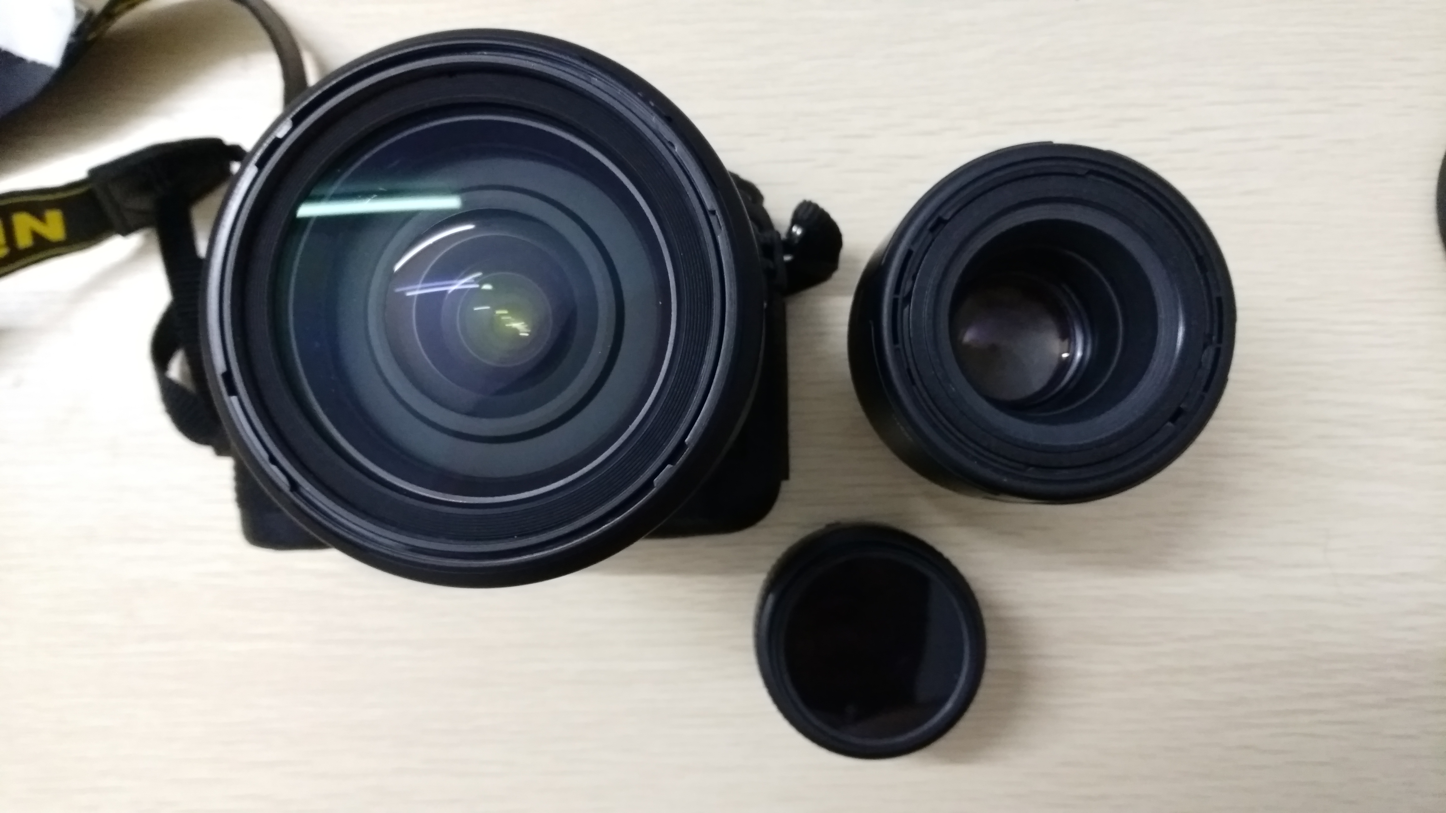 单反定焦和变焦对比,单反相机怎么选性价比高的