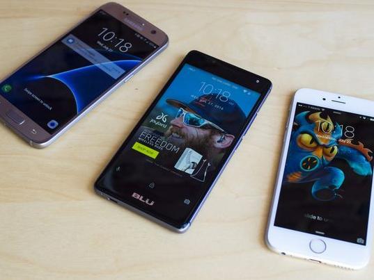 美媒:间谍游戏-购买中国智能手机有风险吗?