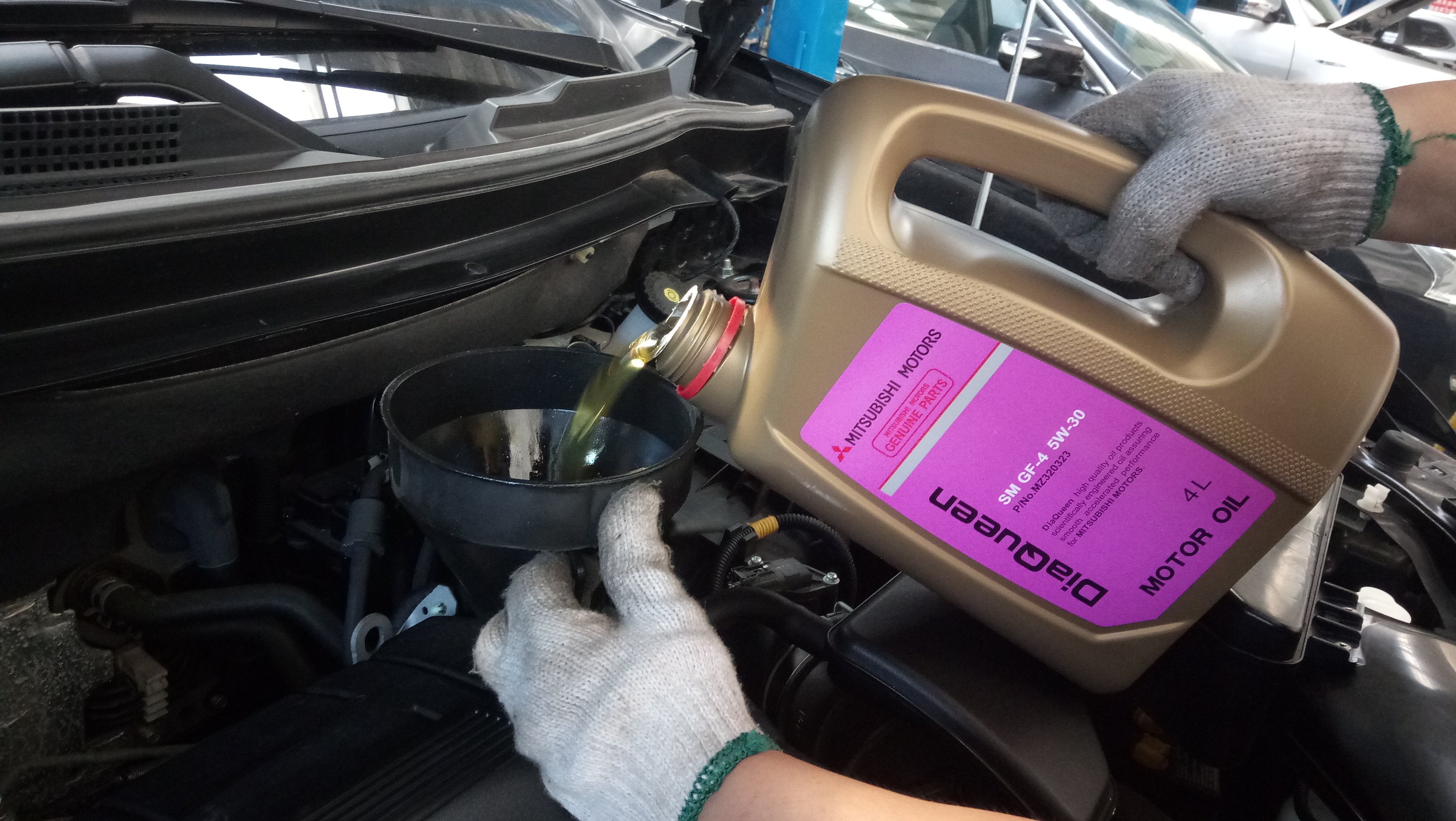 三菱欧蓝德换机油用多少,三菱欧蓝德更换胜牌机油