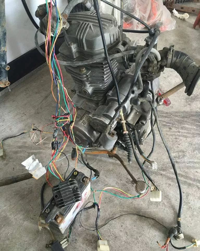 摩托车泡水后打不着火,摩托车亏电打不着火解决方案