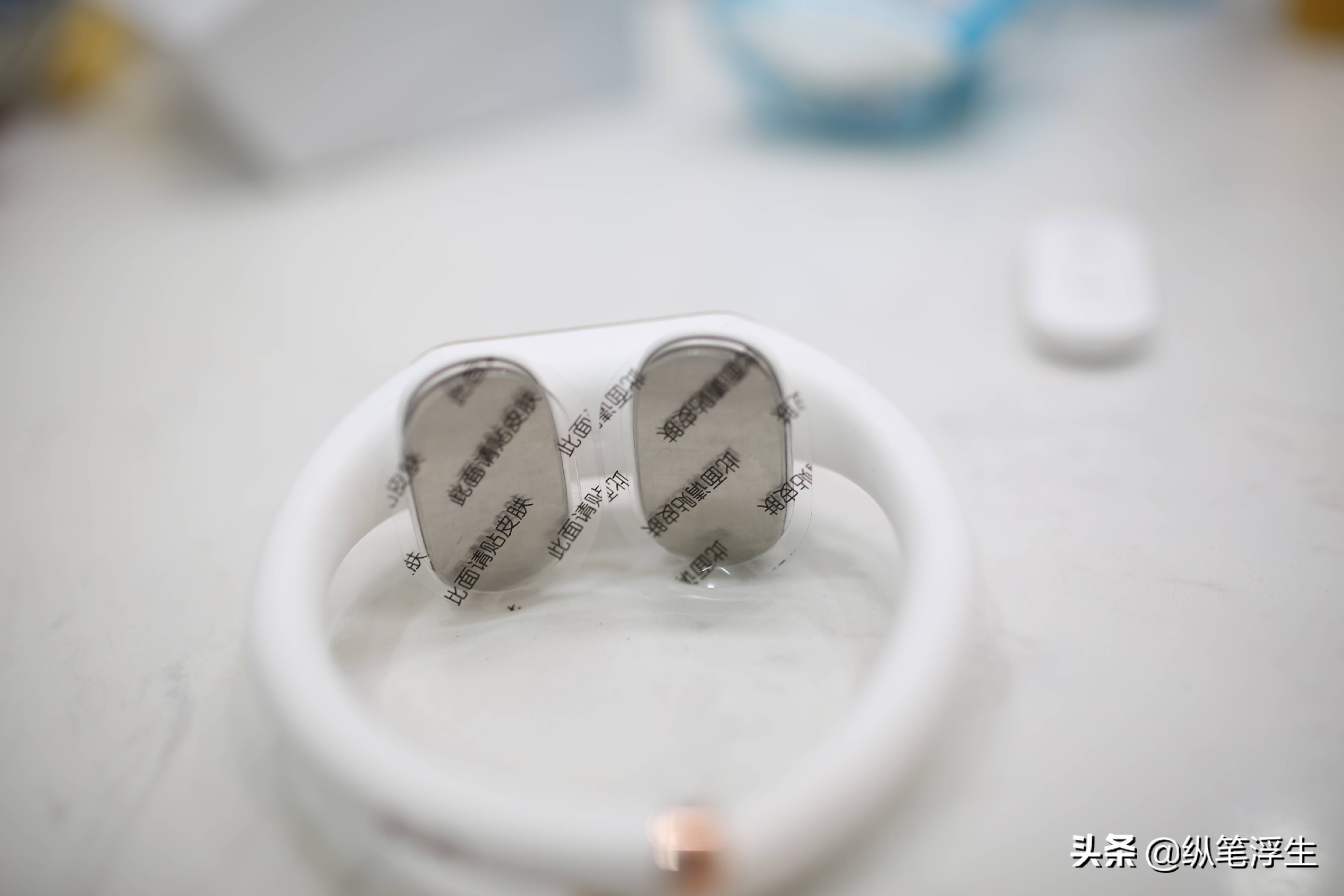 电脉冲、热敷按摩*管双**齐下：人与物AM2011颈椎按摩器测评