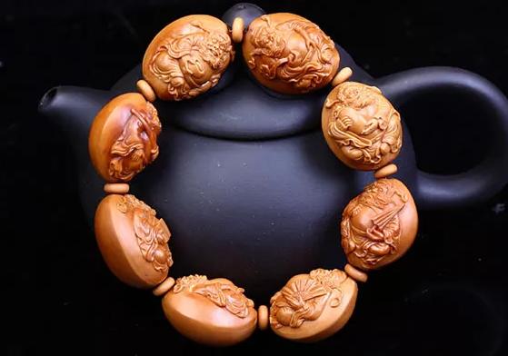 橄榄核雕如何分辨机雕和手修,橄榄核雕有黄斑怎么处理