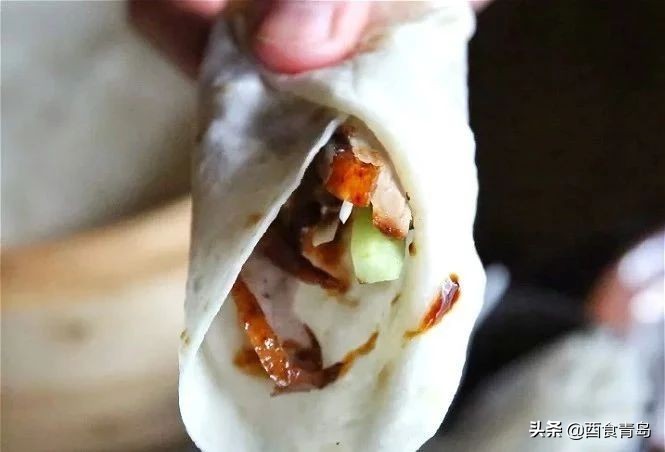 普京大帝在青岛吃的烤鸭,也是我的最爱,除了贵没毛病