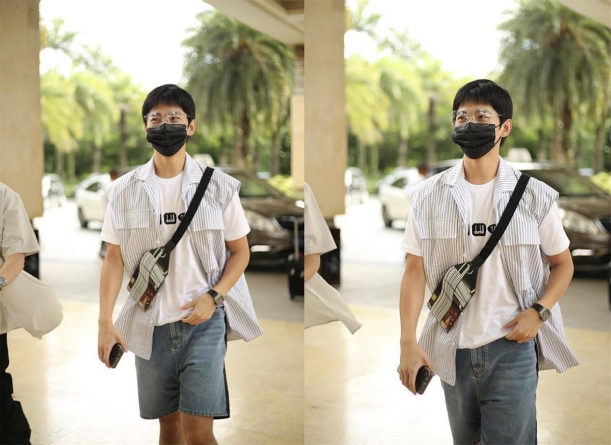 齐刘海短发男杨洋,杨洋穿的黑色马甲搭配黑色衬衣