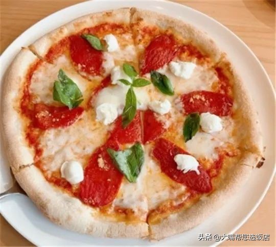 #吃遍大连#披萨的诱惑!一个蕴藏着芝士力量的神物