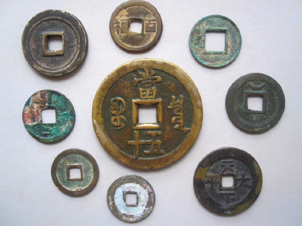 三星堆带金面具的铜人,三星堆铜人像面具