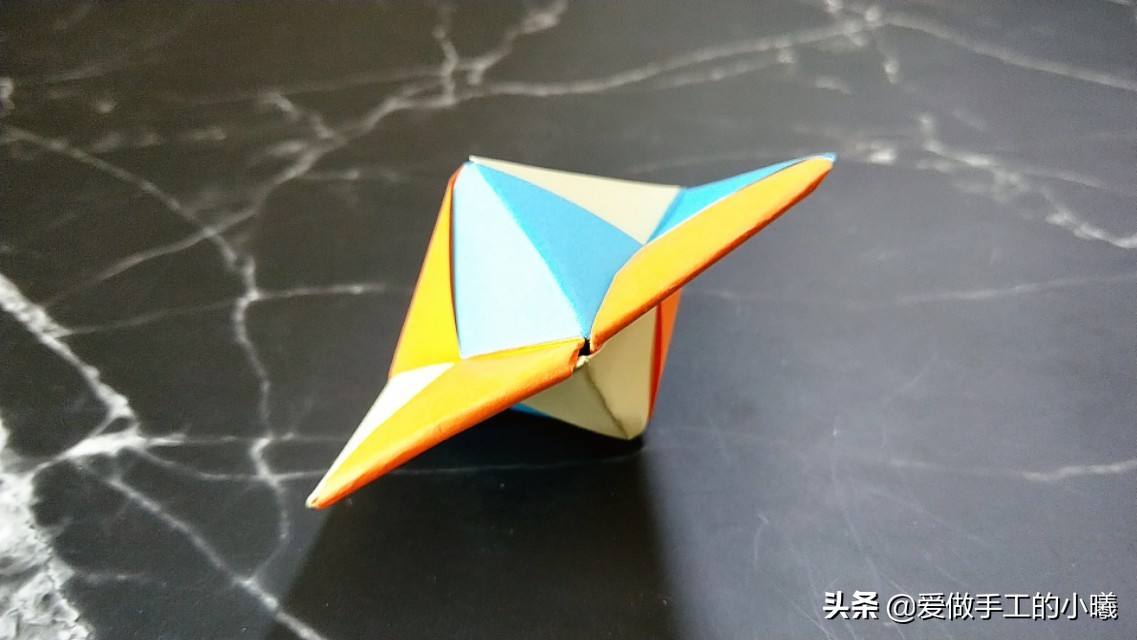 折纸教程陀螺,折纸陀螺教程一分钟