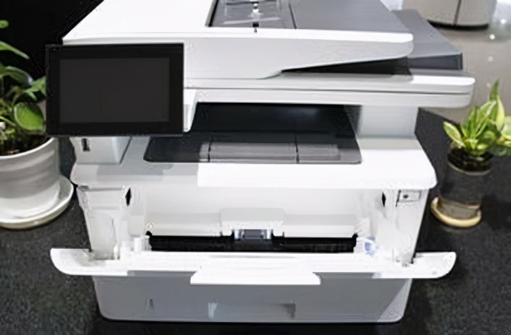 惠普mfp136nw打印复印扫描一体机,满足企业商务办公的需求