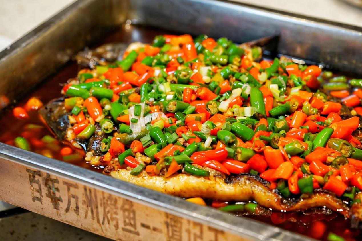 重庆万州烤鱼20年老店,谭记万州烤鱼沙坪坝总店