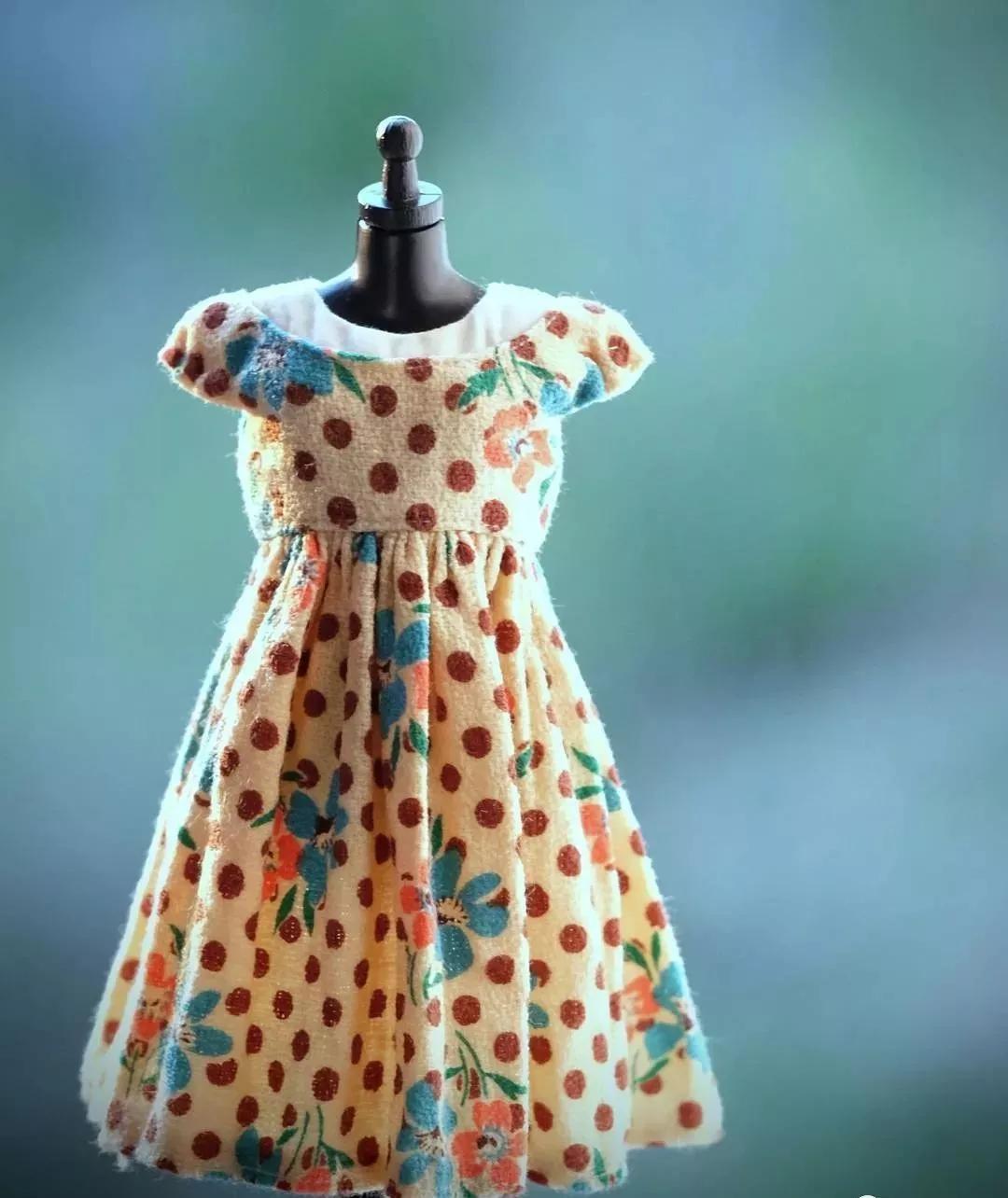 恨不能把她的芭比娃衣穿上自己身上......