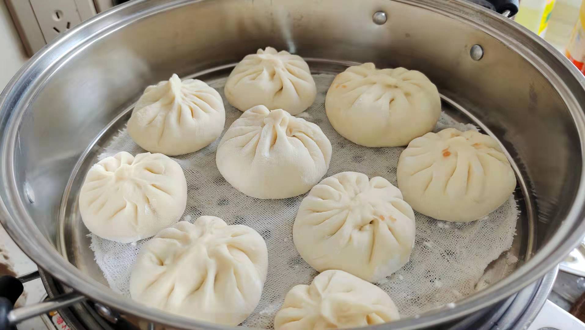 蒸包子是冷水蒸还是开水蒸包子,蒸包子是热水还是凉水蒸包子好