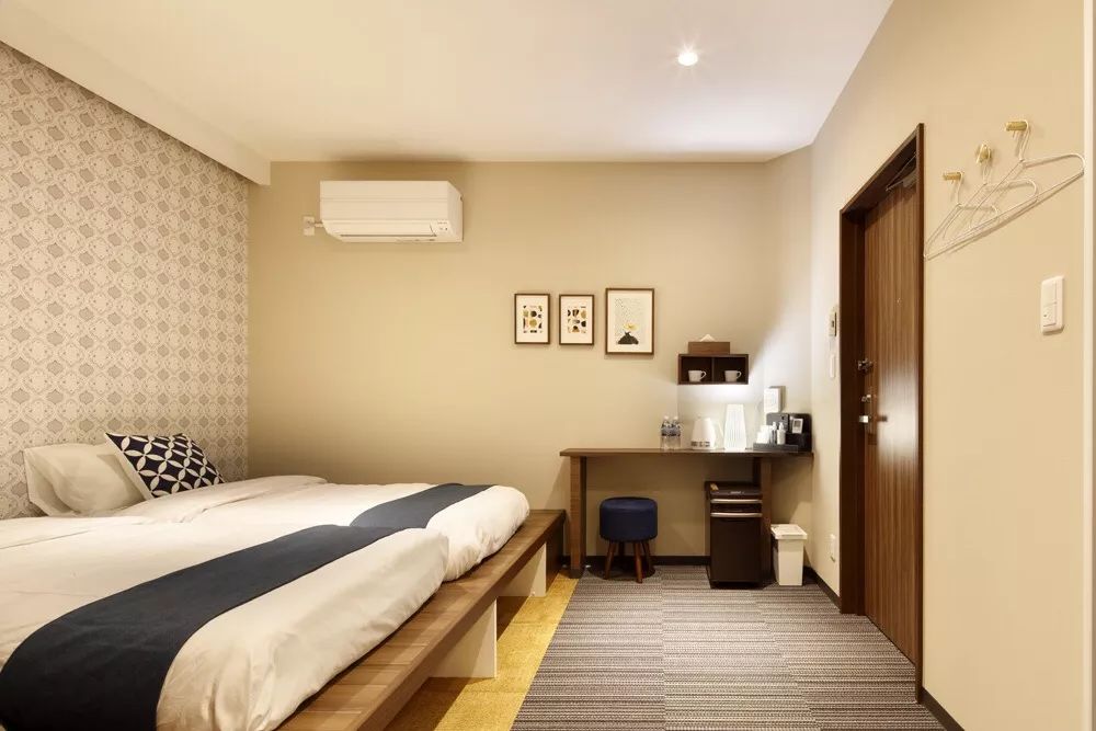 她在大阪买地并找建筑公司造了一家酒店