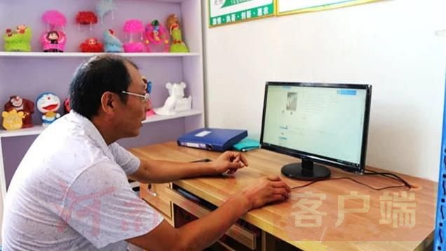 “电商达人”吴铁信身残志坚摘“穷帽”