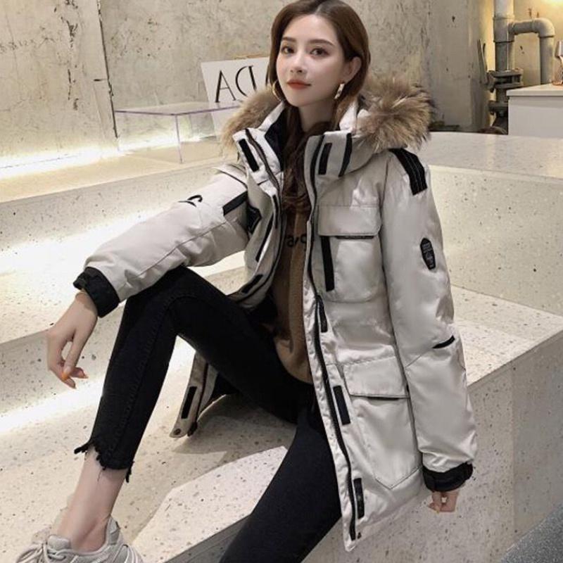 羽绒服千万别乱买这样穿又暖又美,羽绒服穿大的暖还是贴身的暖