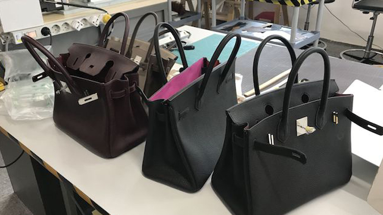 假冒国际名牌包包制假窝点被端,假冒名牌包最新案例