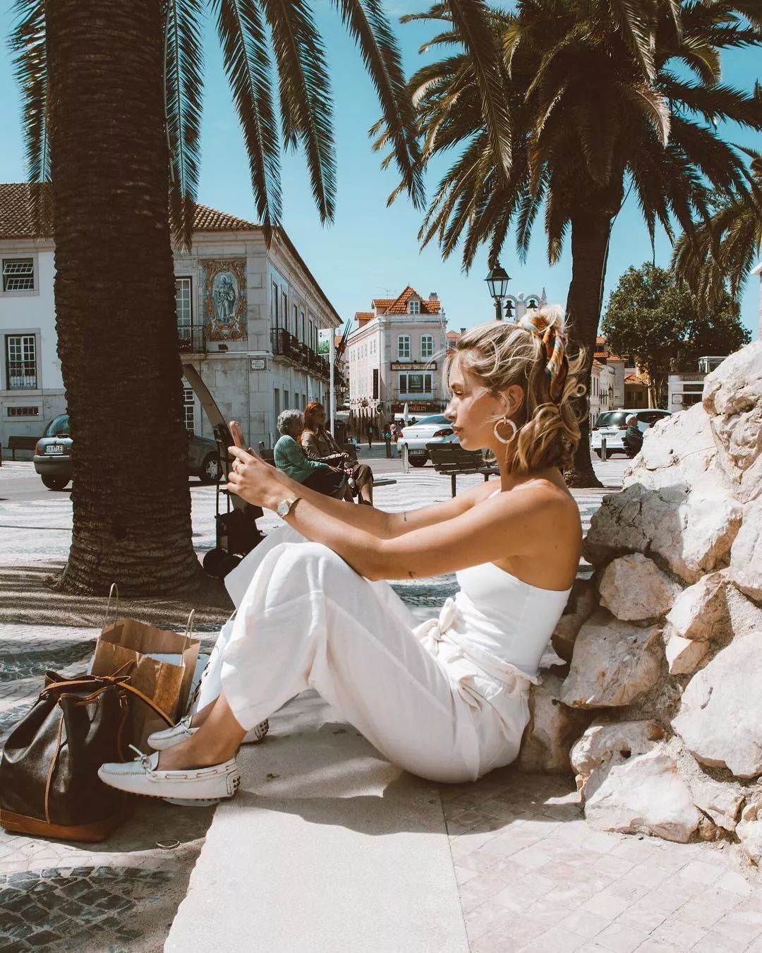 会背奢侈品包包,会背水桶包的人