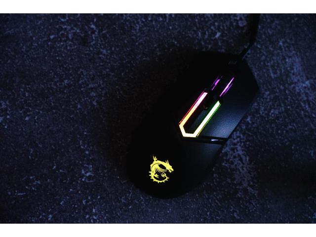 看样子就很有料，这个自带龙纹身的鼠标果然很不一般