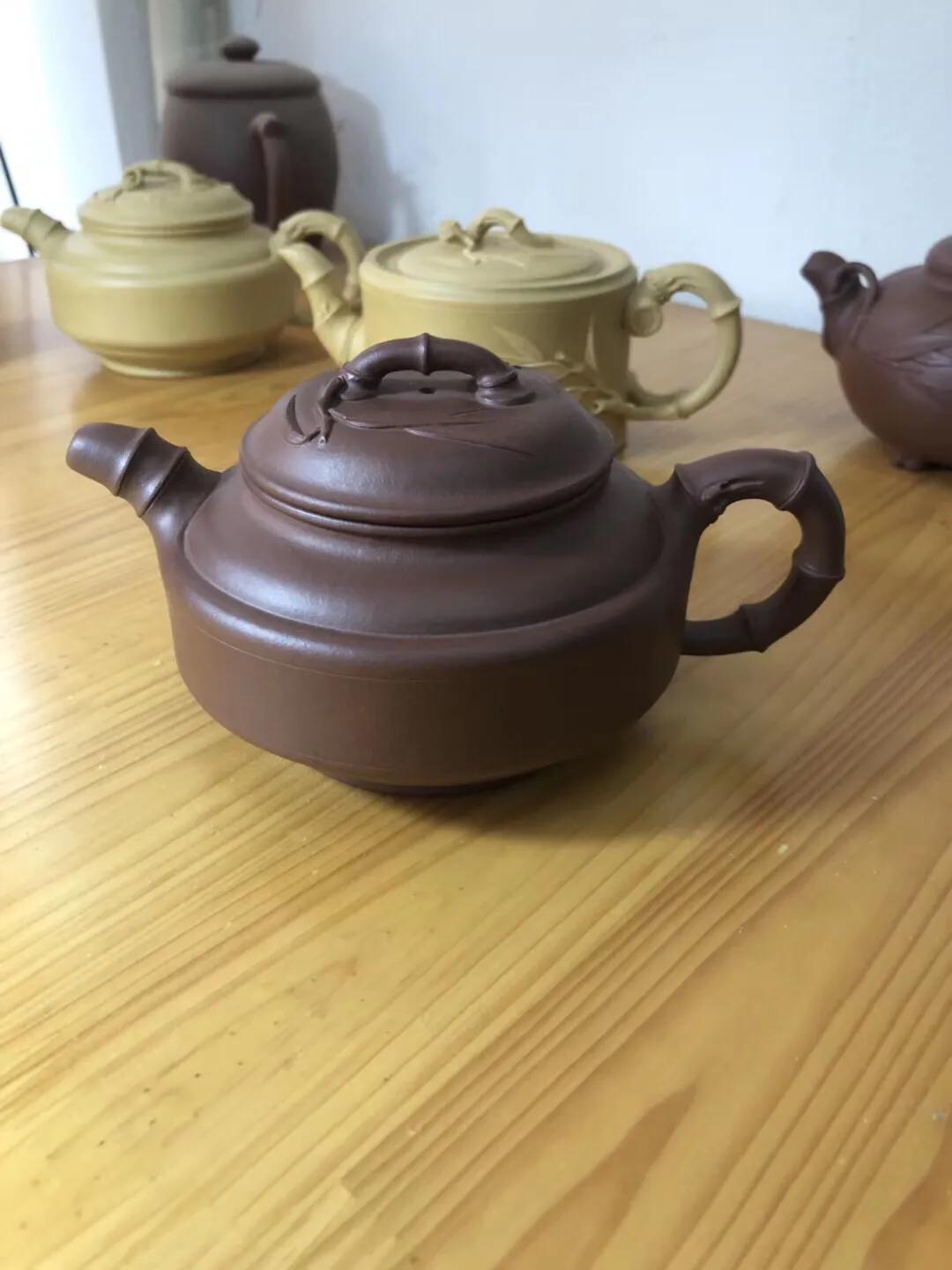 紫砂壶冷热交替去异味是什么原理,紫砂壶没气味是化工壶吗