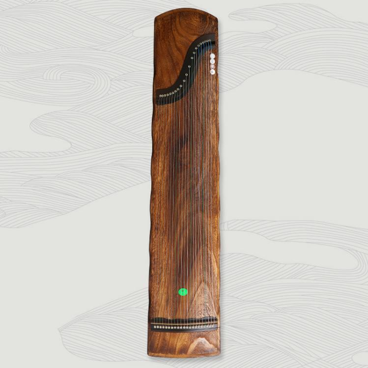 整挖古筝和手工古筝区别在哪里,整挖古筝