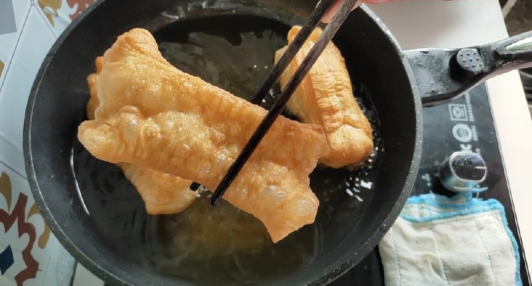 油条怎么做会更酥脆,油条怎么蓬松酥脆