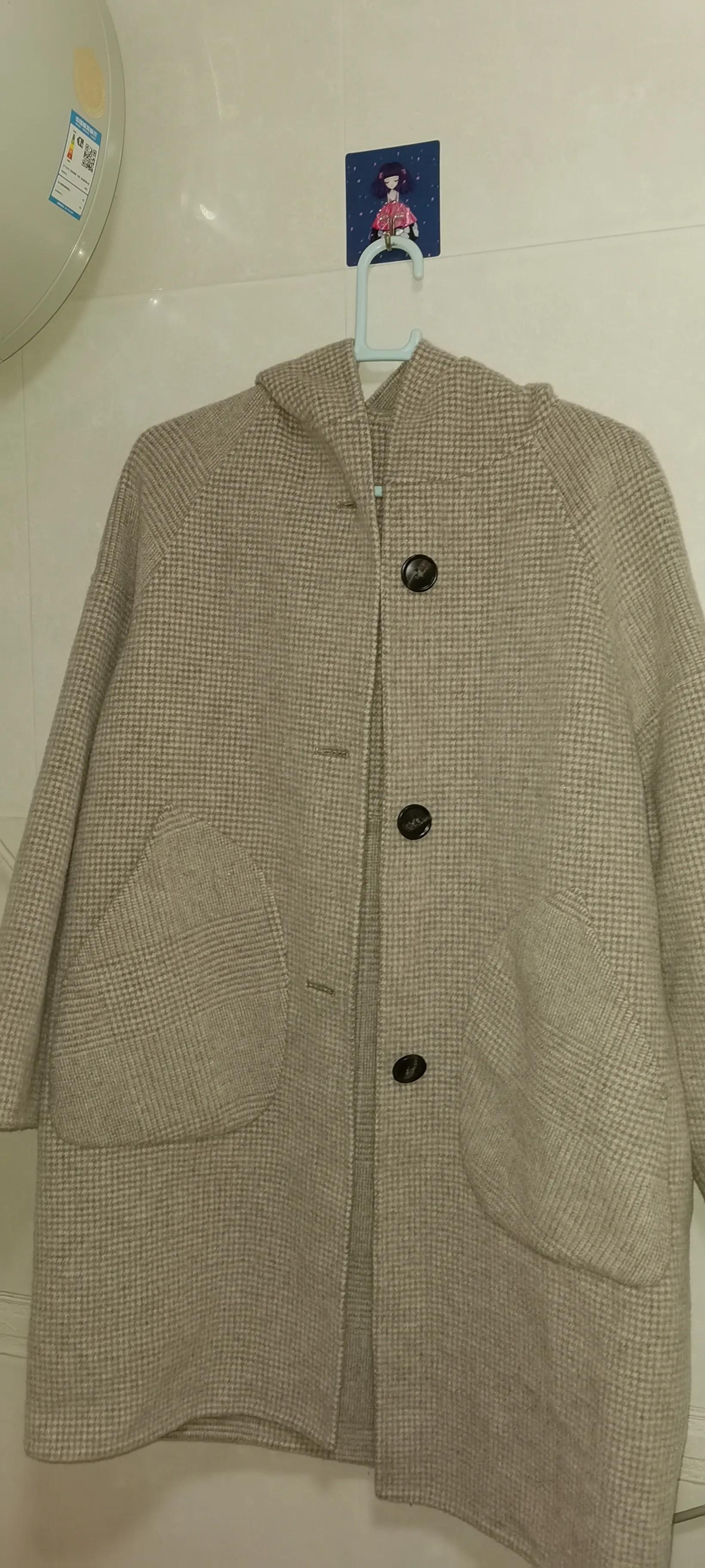 纯羊毛大衣怎样用水洗不缩水,不是百分百羊毛大衣能水洗吗