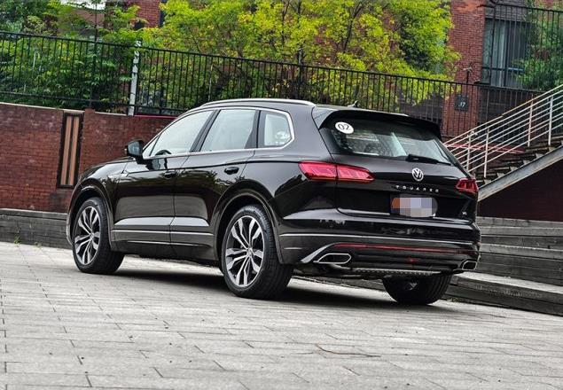 开完宝马x5再换大众途锐,开完宝马x5再换到保时捷