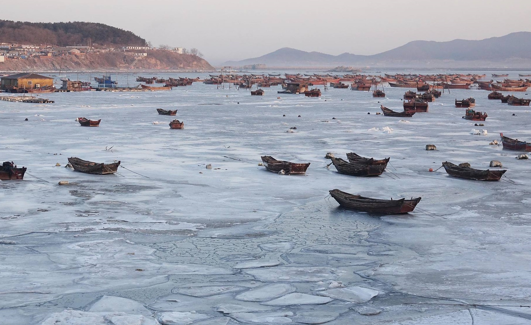 辽东湾海冰厚大的形成原因,辽东湾海冰期长原因