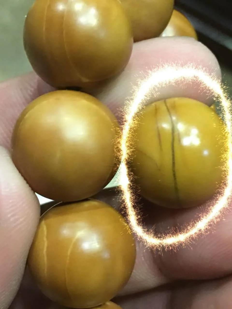 橄榄核花了有的地方发黑,橄榄核尖盘花了怎么办