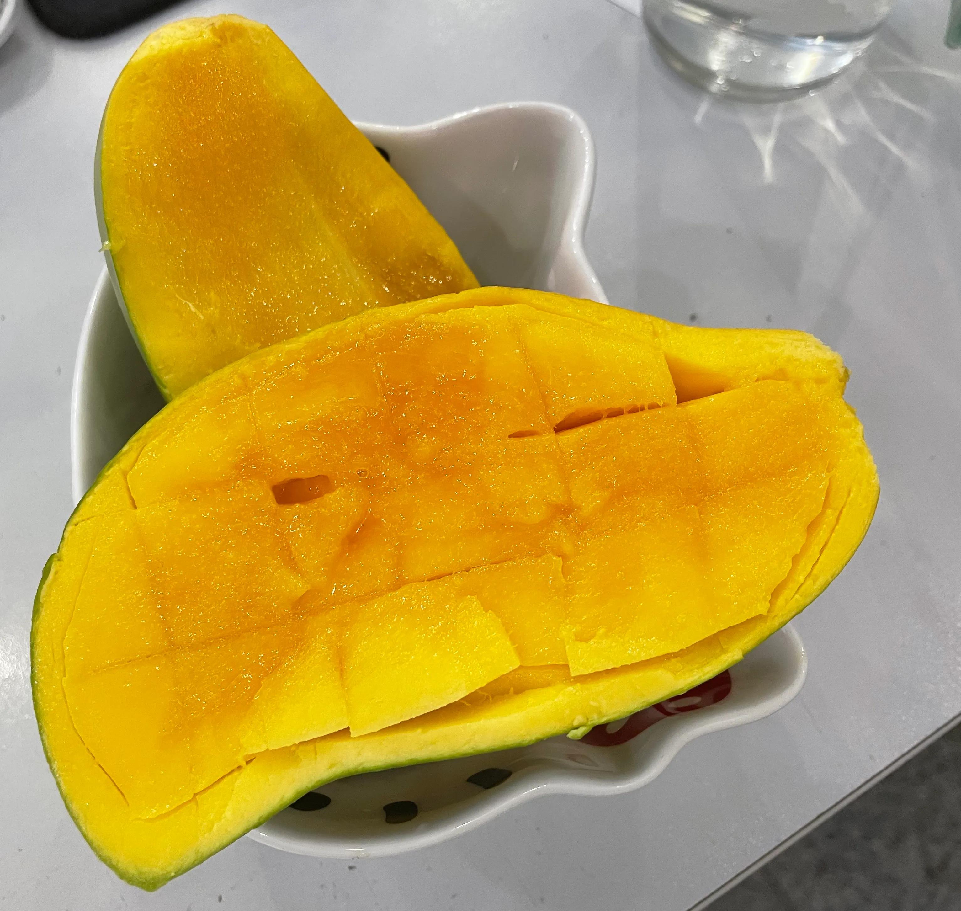 芒果不去皮怎么吃,芒果不太熟怎么办