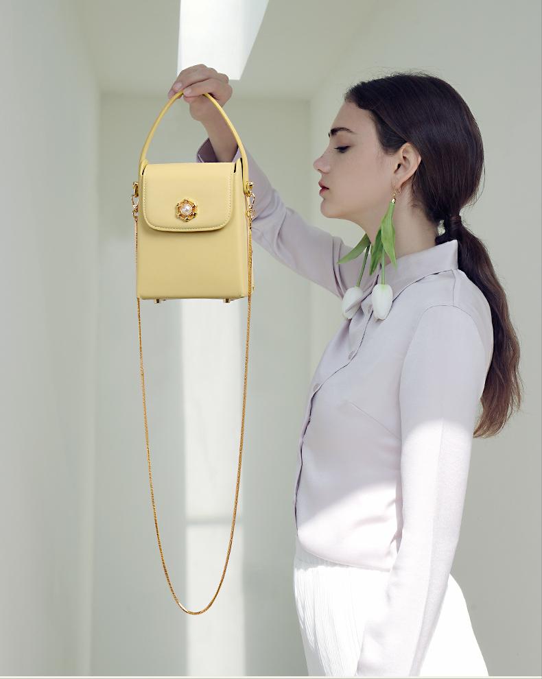 40到50岁女人适合背什么包包,40岁女性背什么牌子的包包