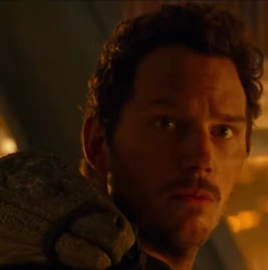 侏罗纪世界星爵安抚迅猛龙的是啥,侏罗纪世界星爵与迅猛龙