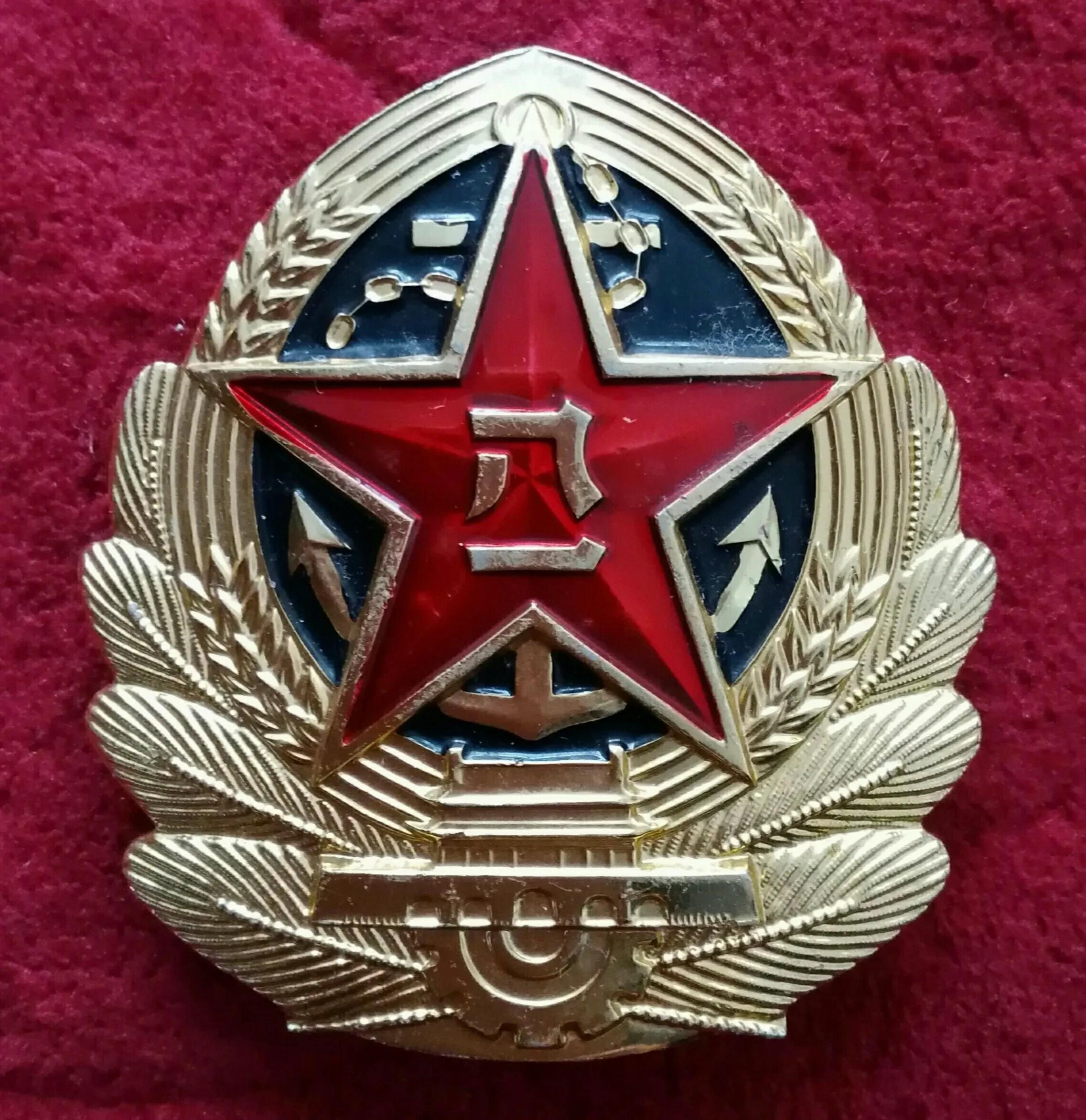 中国消防救援帽徽,毛启国警衔图片