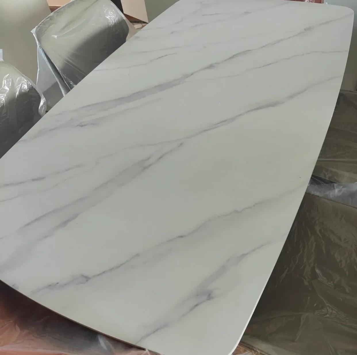 岩板餐桌跟天然石餐桌哪个好,七星石餐桌和岩板餐桌区别