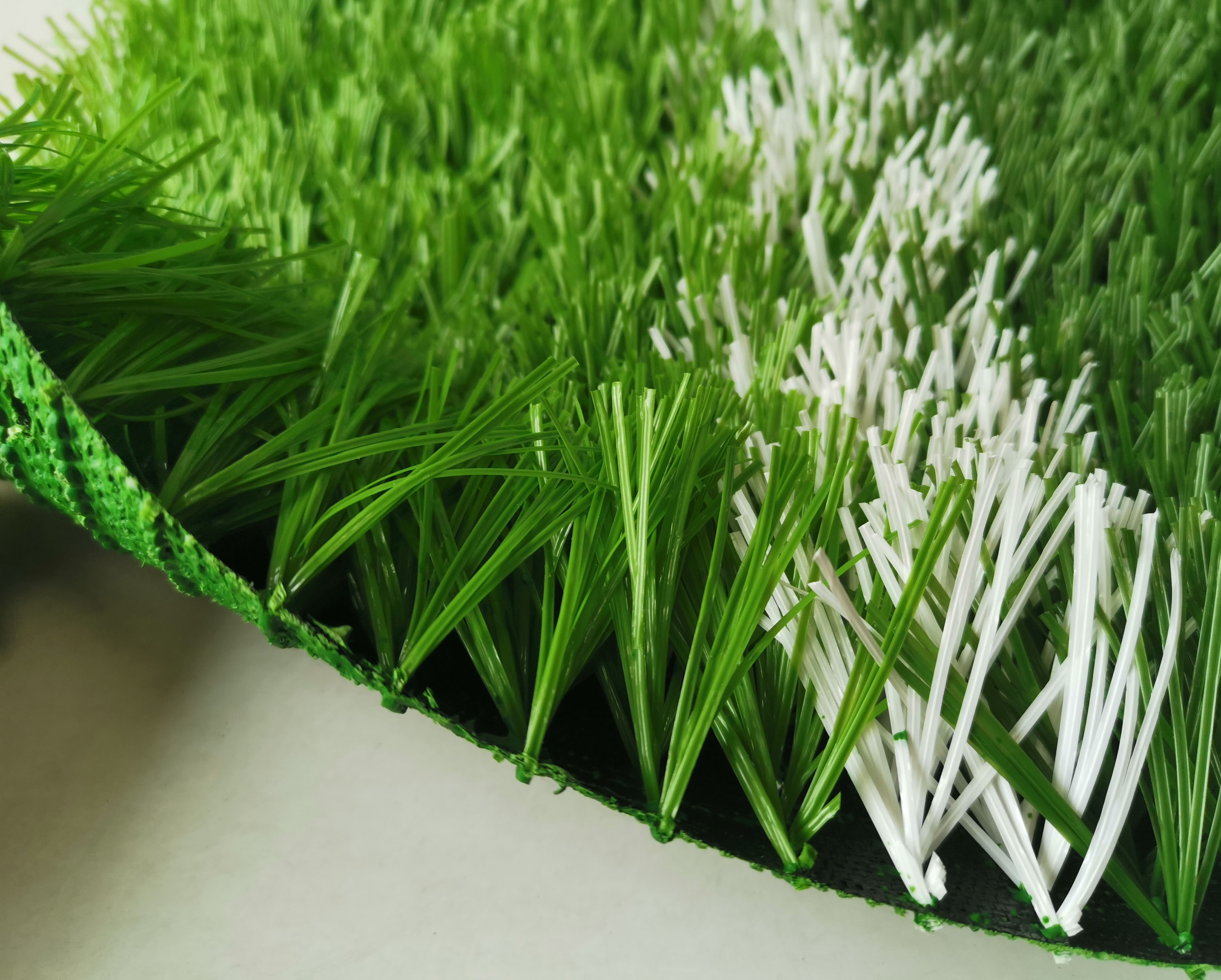 学校足球场人造草坪标准,学校足球场人造草多少钱