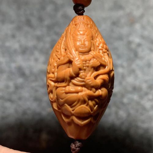 橄榄核雕方寸之间,舟山核雕方寸之间