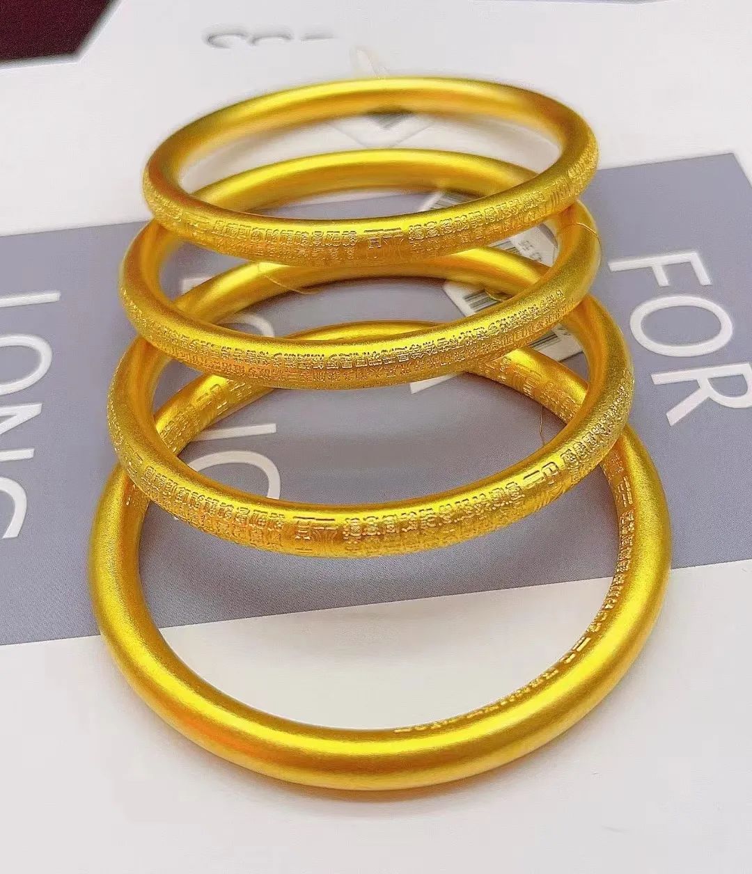 各个品牌黄金首饰字母缩写,珠宝标签上的字母和数字含义