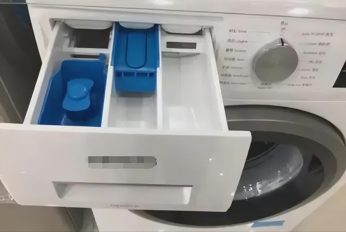 滚筒洗衣机衣服有小洞怎么回事,滚筒洗衣机筒里有东西怎么办