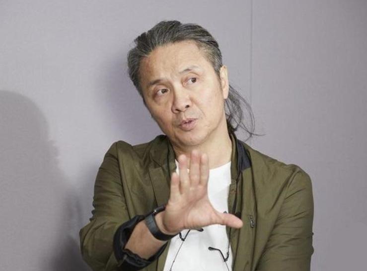 林正英的大师兄的照片,林正英大师兄穿的是紫袍么