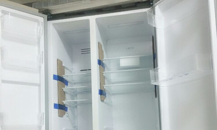 冰箱响声很大嗡嗡侧面烫,冰箱开门不响关门响怎么解决