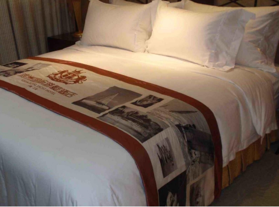 酒店床上那块布到底是干啥用的,酒店的床上放一块布是什么意思